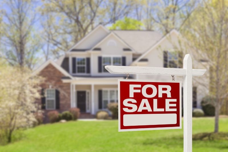 A home in Fraser Valley with a for sale signage